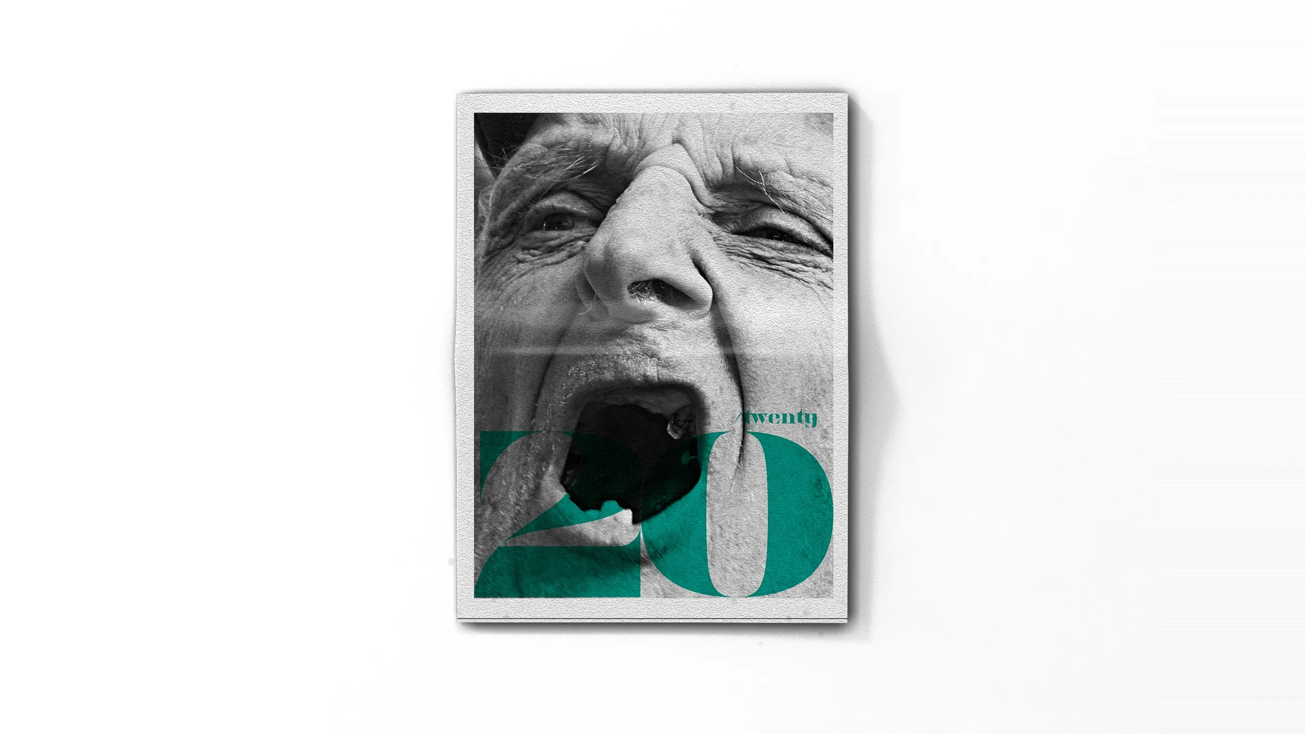 The folded 20Twenty newspaper on a white surface: a black and white close-up of a shouting face with a large green 20 across it.