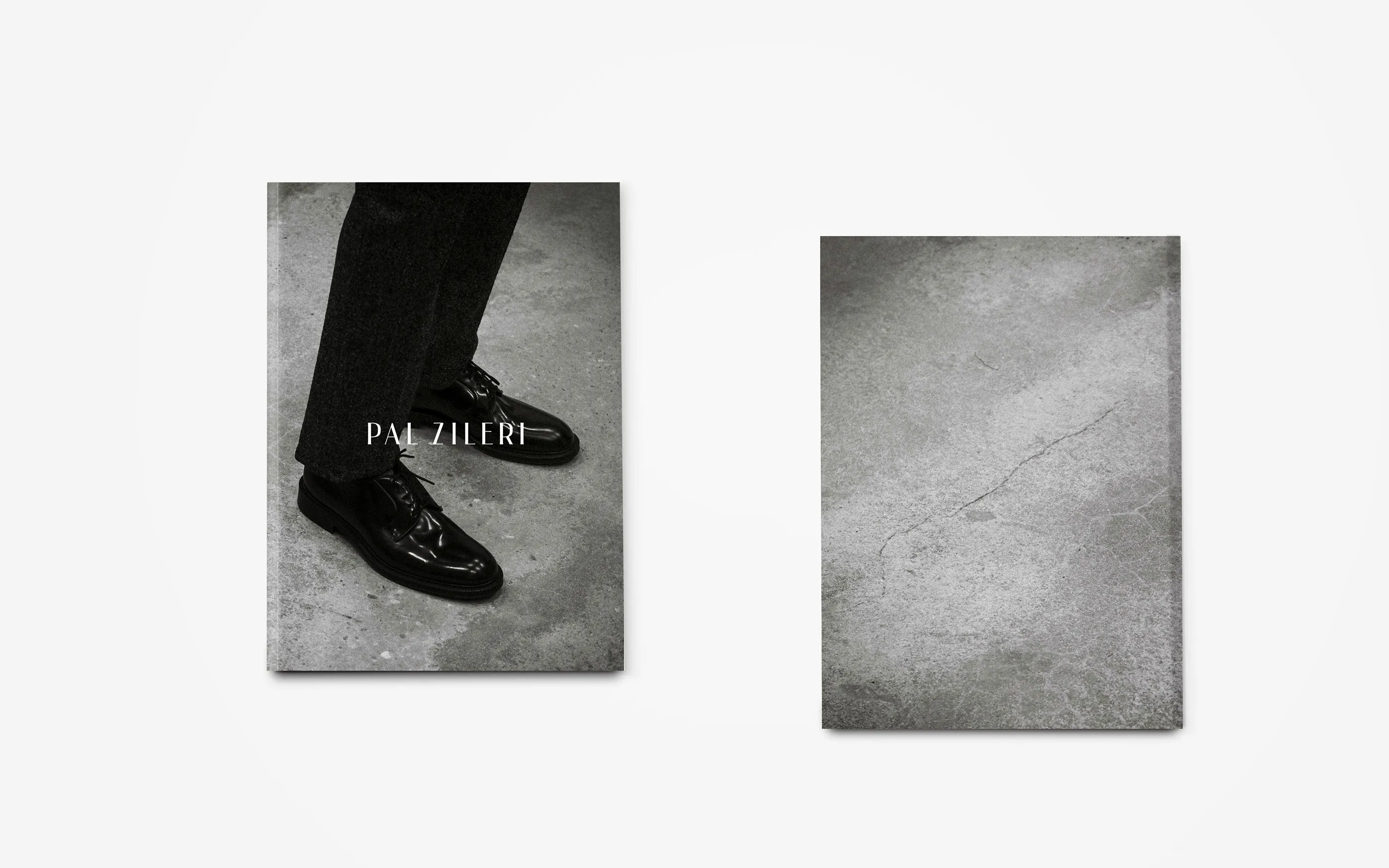 Front and back cover of the Pal Zileri book on a light grey surface: polished black shoes on concrete with the Pal Zileri wordmark, and a plain concrete texture on the back.
