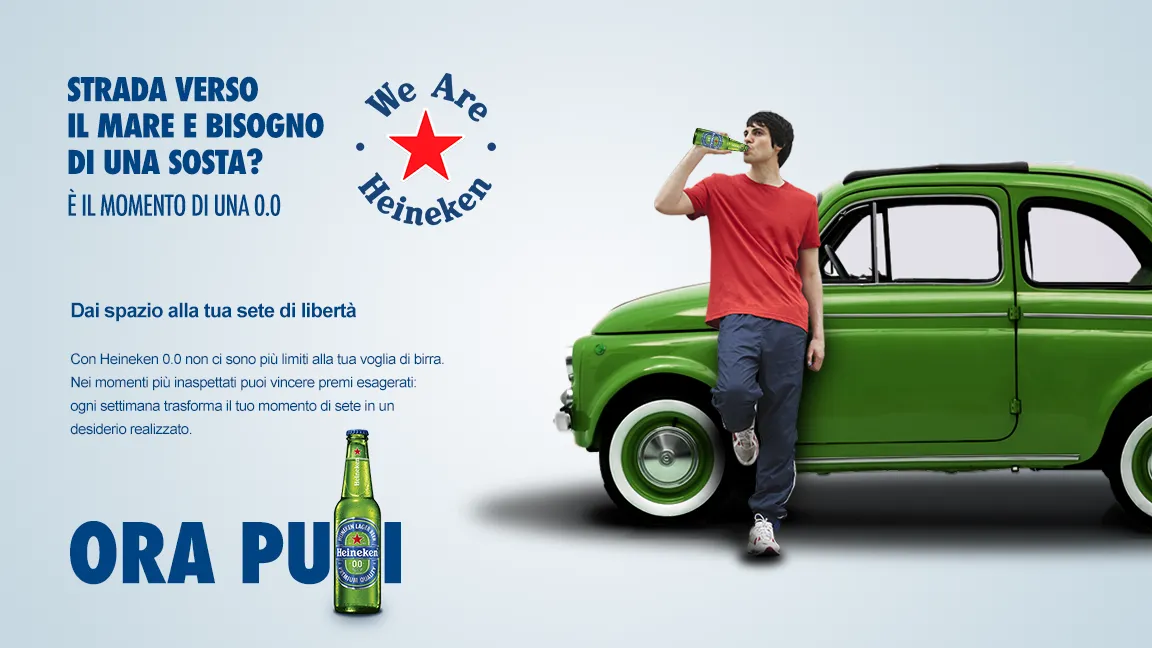 A young man drinks a Heineken 0.0 leaning on a green Fiat 500: “On the road to the sea and need a stop? Now you can.”